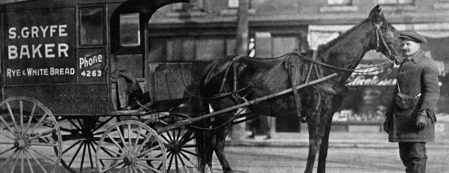 Historical photo of S. Gryfe Baker storefront with horse-drawn delivery cart